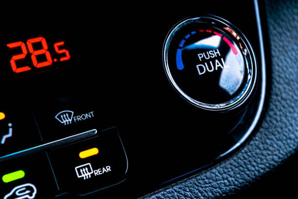 istock Air conditioning button inside a car. Climate control AC unit in the new car. Modern car interior details 903666500