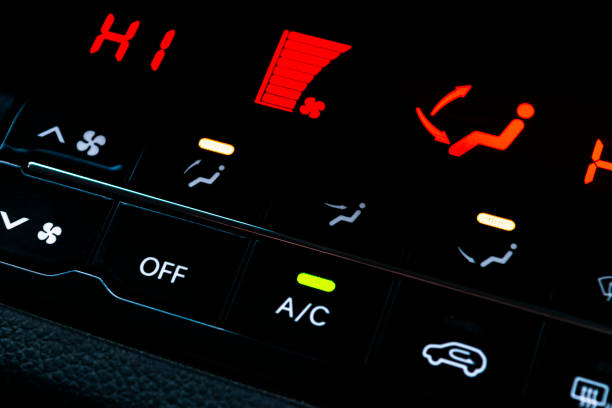 istock Air conditioning button inside a car. Climate control AC unit in the new car. Modern car interior details 903666548