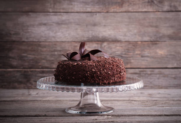 istock Chocolate cake on old wooden table 903666666