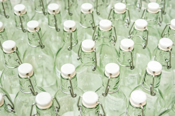 istock Empty glass bottles with caps in supermarket 903666706