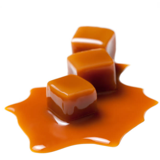 Caramel With Sauce Golden Butterscotch Toffee Candy Caramels Sweets With  Copy Space Macro Stock Photo - Download Image Now - iStock
