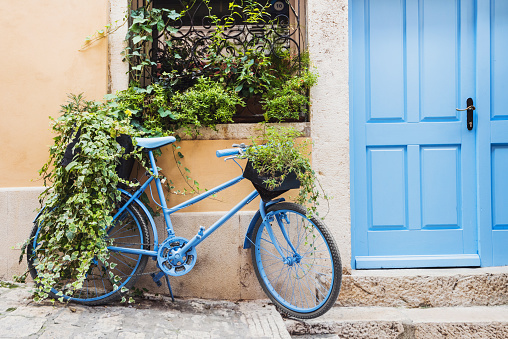 Vintage old-fashioned bike on a Mediterranean street