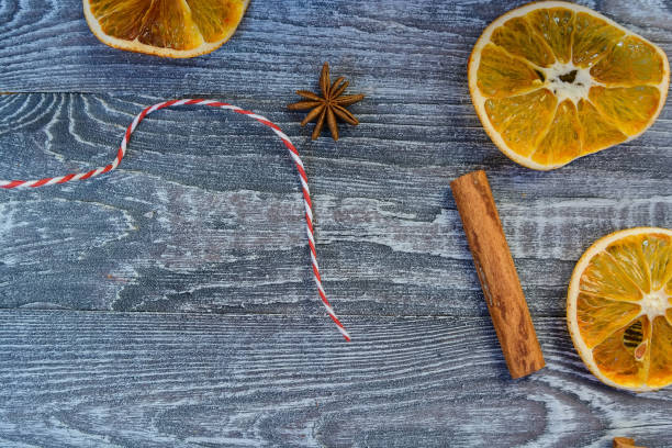 istock Christmas spices on wooden background 903675524