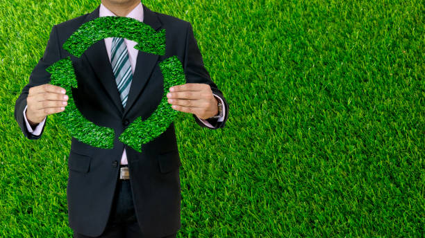 istock Businessman hold Recycle Green Grass Eco Environment 903677786
