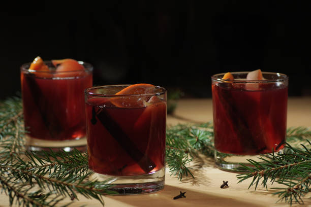 istock Hot wine drink. Warm Christmas wine. Mulled wine with oranges an 903677838