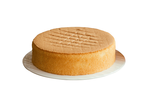 Homemade chiffon or sponge cake on white plate on white isolated background with clipping paths. Homemade bakery concept to present foam type cake so soft and lite good smell and delicious.