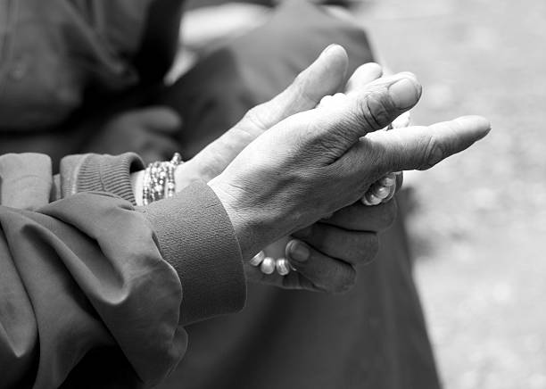 istock Hands of a Tibetan Monk in Black and White 90368194