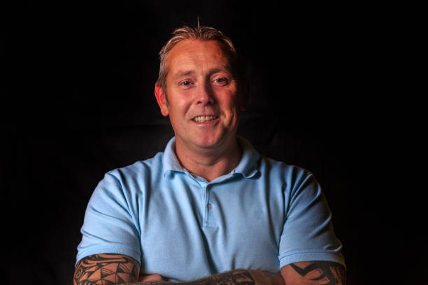 Mature blonde haired man  headshot portrait