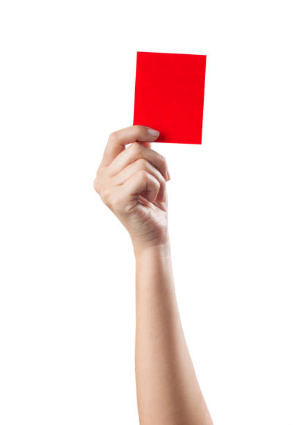 Hand Holding Red Card Red card isolated on a white background punishment photos stock pictures, royalty-free photos & images