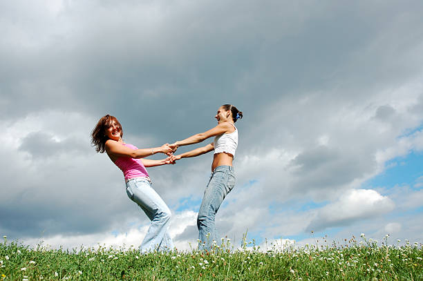 istock Girls on the meadow 90368610