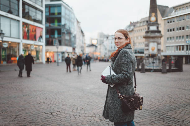 istock Young woman enjoying winter day outdoors in Germany 903686496