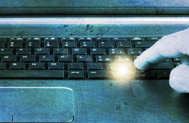 istock Man hand working on laptop. Blue tones and texture effect. 903689678