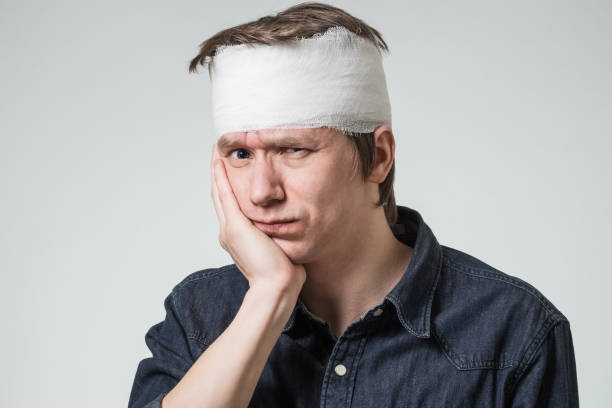 istock Man with bandge on his head 903691442