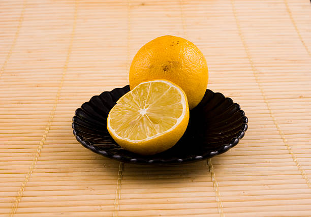 istock Half of lemon on the saucer 90369426