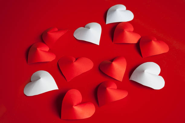 istock Heart-shaped cut paper Arrange as background. 903694922