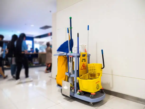 Cleaning tools cart wait for cleaning.Bucket and set of cleaning equipment in the Department store
