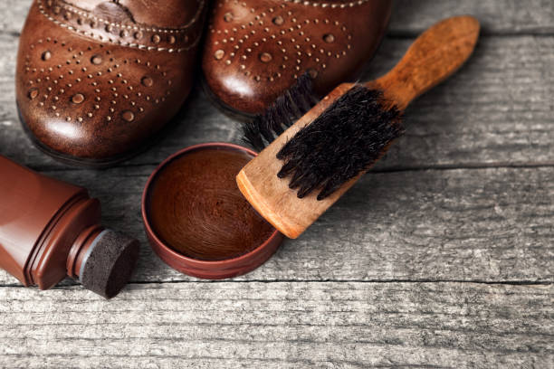 istock Shoes on table with polishing equipment 903695738
