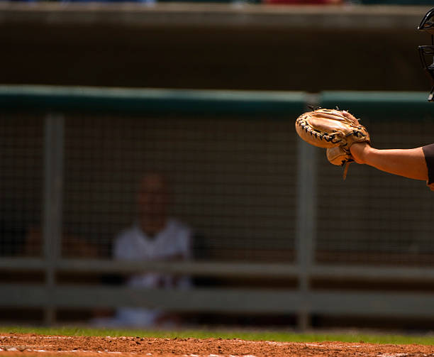 istock Baseball Player Catching Baseball at Home plate. 90369892