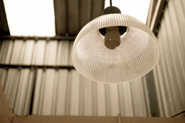 istock Old or vintage light lamp hanging on ceiling 903702778