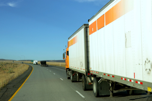 Semi truck going fast on interstate highway