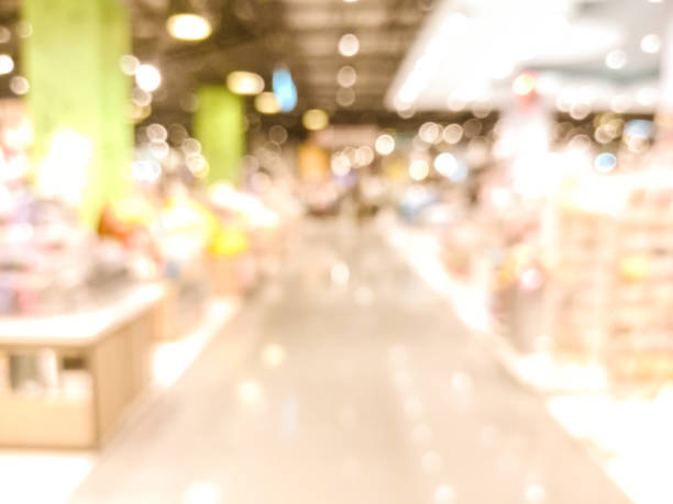 istock Blurry image of footpath in shopping mall. 903706918