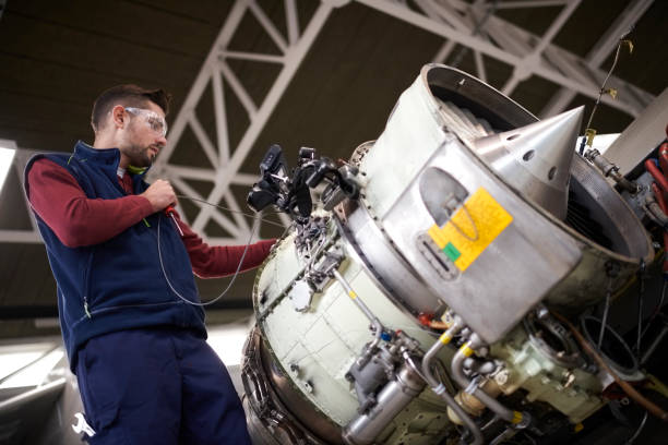 istock Aircraft mechanic in the hangar 903707880