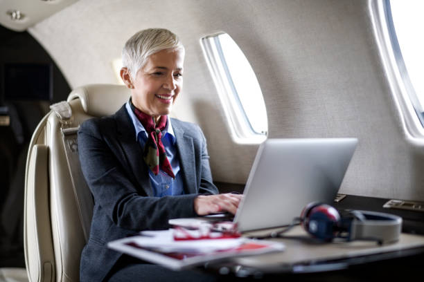 istock Businesswoman in private jet airplane 903708446