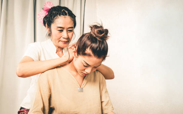 istock Woman is getting neck massage in Thai Massage Spa 903712650