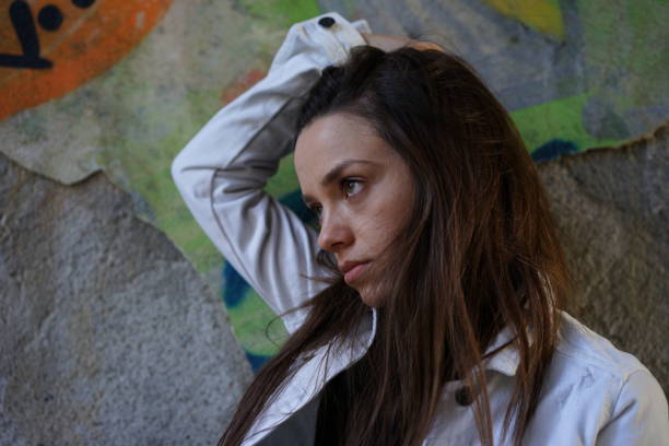istock Woman With Long Hair Against Wall 903713478