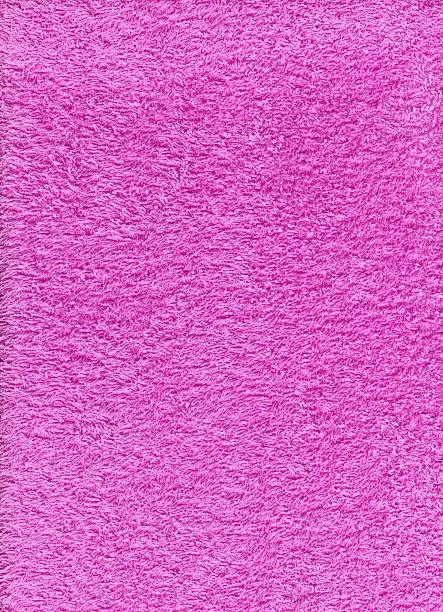 Photo of Texture of pink terry cloth towel