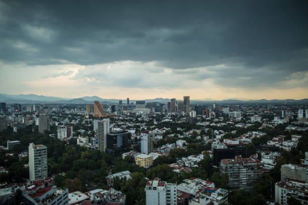 Mexico City from above on a could day at dusk.