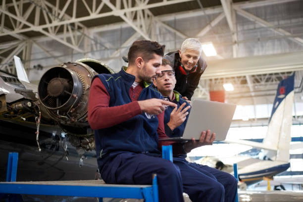 istock Aircraft mechanics in the hangar 903718944