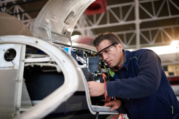 istock Aircraft mechanic in the hangar 903719380
