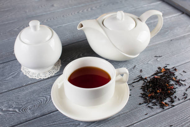 istock Cup of tea with teapot. Top view 903722726