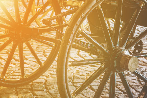 istock Details of old vintage carriage wheels 903730166