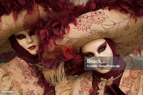 Two Female Masks With Beautiful Costumes At Carnival In Venice Stock Photo - Download Image Now