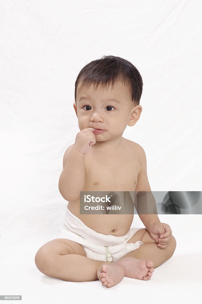 Bebê Mordendo o dedo - Foto de stock de 0-11 meses royalty-free