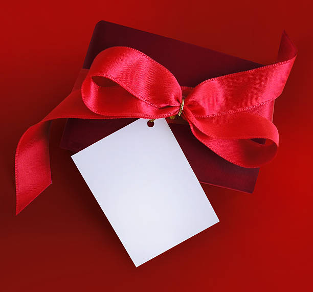 istock Present with red ribbon and card. 90373140