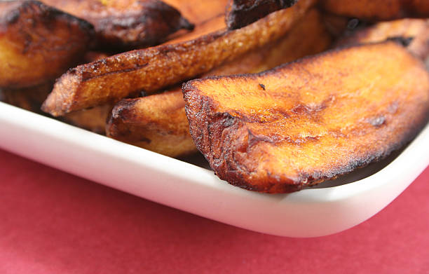 Fried Plantains  plantain stock pictures, royalty-free photos & images