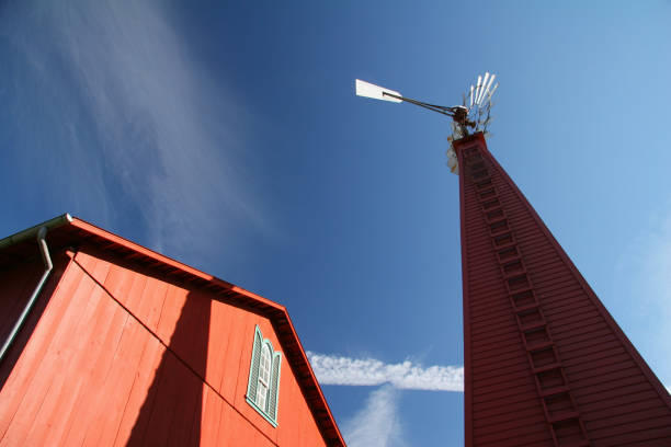 An old barn and windmill on a South Dakota farm.