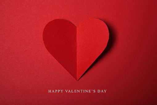 Happy Valentines day, Red Heart from paper. Good Holiday Card.