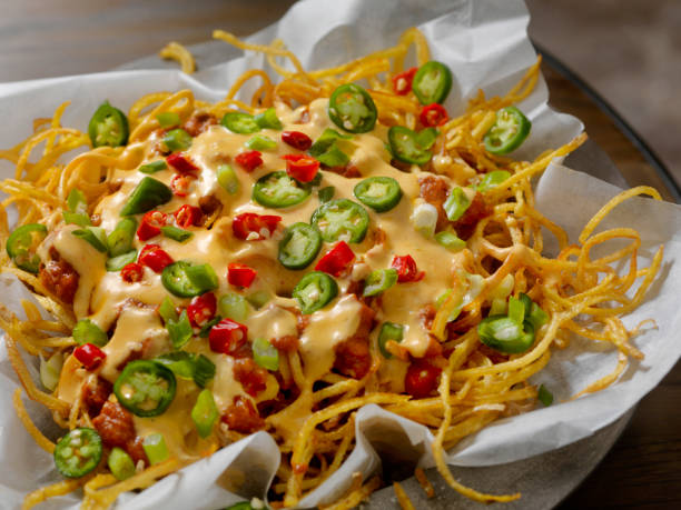 istock Nacho Style Thin and Crispy Spiral Fries with Chili and Cheese Sauce 903758320