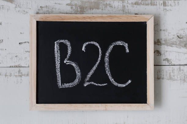 istock B2C. Business to consumer business model. Blackboard with handwritten text 903759586