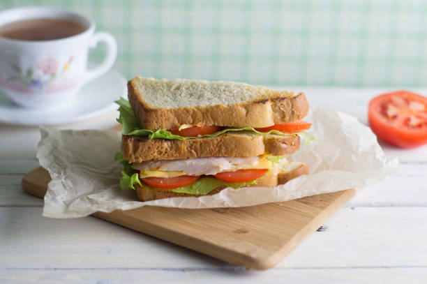 istock Sandwich with chicken, tomato and cheese 903765826