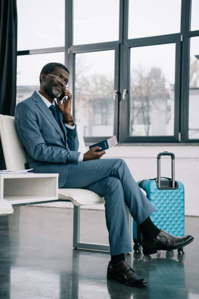 istock businessman talking by smartphone 903771974