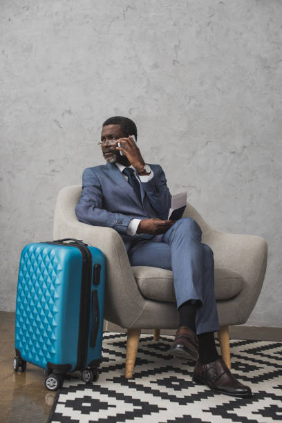 istock Businessman talking by smartphone 903772750
