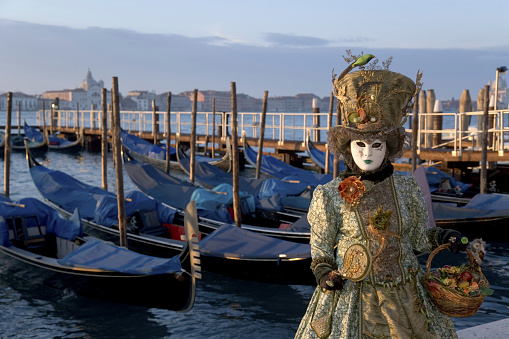 Shop with different colorful Venetian masks for the Venice Carnival. Italian traditional festival concept.