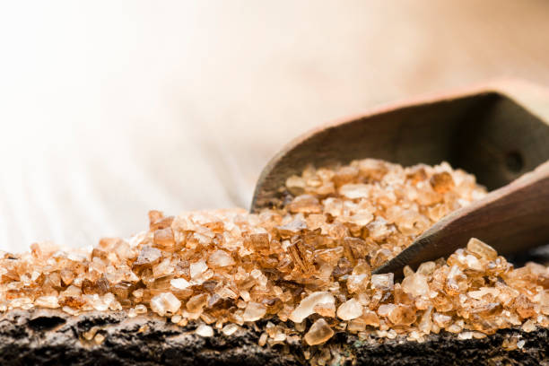 smoked salt wooden scoop with smoked salt on table smoked stock pictures, royalty-free photos & images