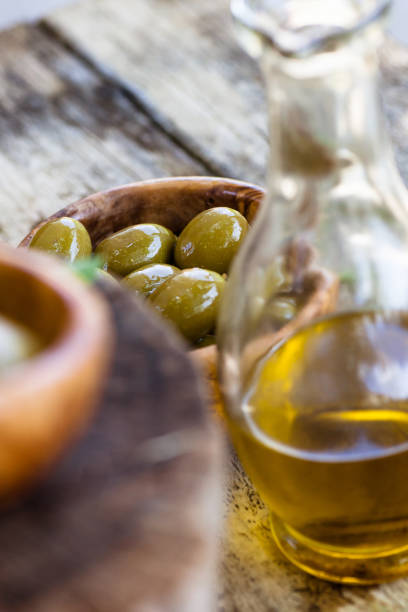 istock Fresh olives on wood 903790632