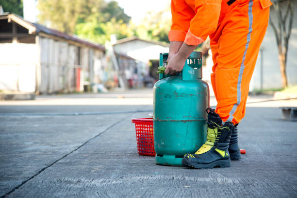 istock gas leak, fire extinguisher training with soft-focus and over light in the background 903790934